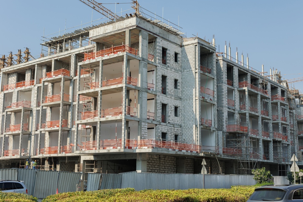 Residential,Or,Commercial,Skyscraper,Under,Construction,With,Visible,Framework,,Scaffolding,