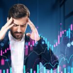 Businessman,Stressed,With,Hands,On,Head,In,Office,,Digital,Holographic
