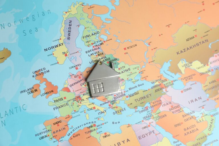 Metal,House,Model,On,World,Map,,Above,View.,Accommodation,Search