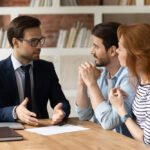 Professional,Male,Lawyer,Financial,Advisor,Consulting,Happy,Family,Couple,Clients