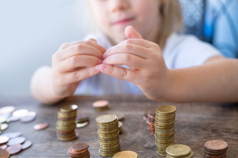 Small,Child,Makes,Roof,Over,Metal,Coins,,Kid,Puts,Euro
