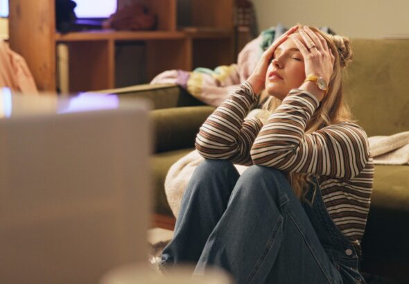 Woman,,Stress,And,Moving,On,Floor,In,House,With,Boxes,