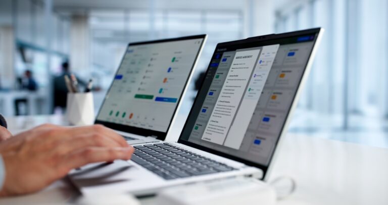 Hispanic,Man,Using,Online,Document,Management,Software,For,Business,Accounting.