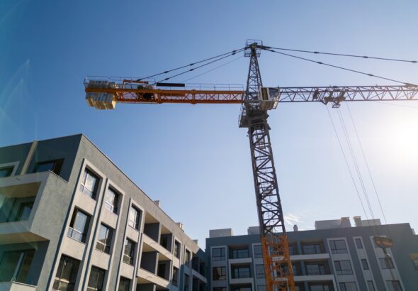 Facade,Of,A,New,Residential,Apartment,Building,Under,Construction,With