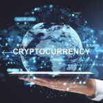 Businessman,Hand,Holding,Tablet,With,Digital,Globe,Showing,Cryptocurrency,,Blockchain,