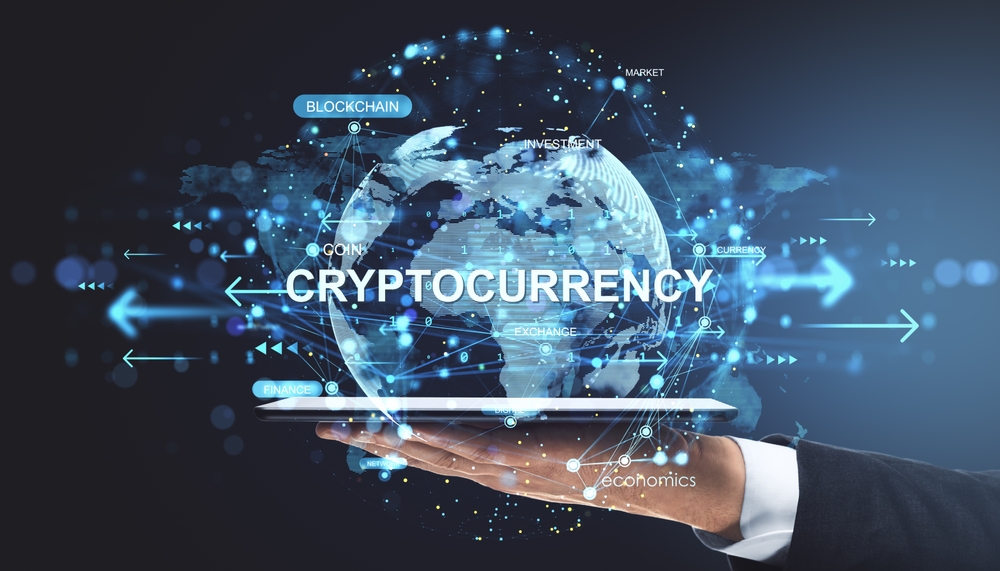 Businessman,Hand,Holding,Tablet,With,Digital,Globe,Showing,Cryptocurrency,,Blockchain,