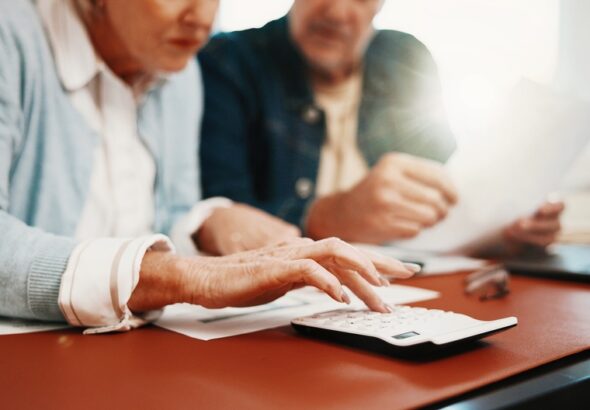Hands,,Finance,And,Senior,Couple,With,Calculator,For,Budget,Planning,