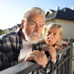Concept,Of,Private,Life.,Curious,Senior,Couple,Spying,On,Neighbours